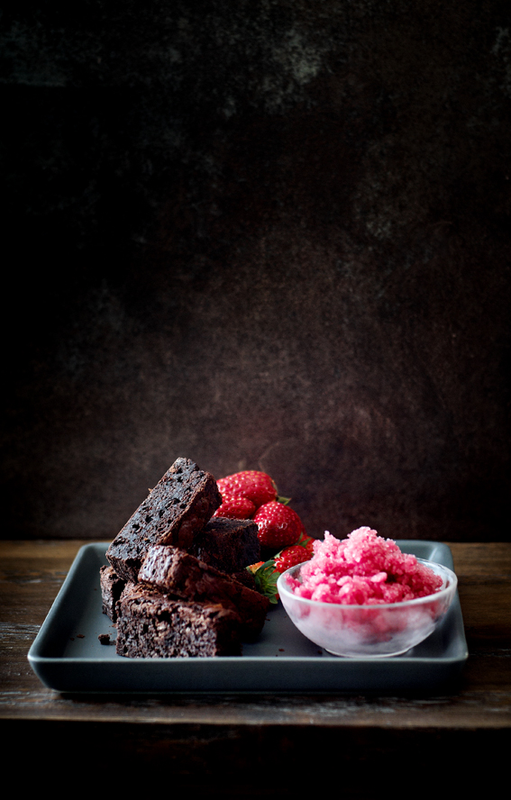 Sticky Chocolate Brownie with blood orange sorbet and strawberries