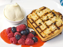 Chargrilled lemon loaf with berries & strawberry sauce