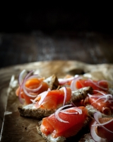 Seeded Loaf w hot smoked salmon Caper cream cheese & red onion